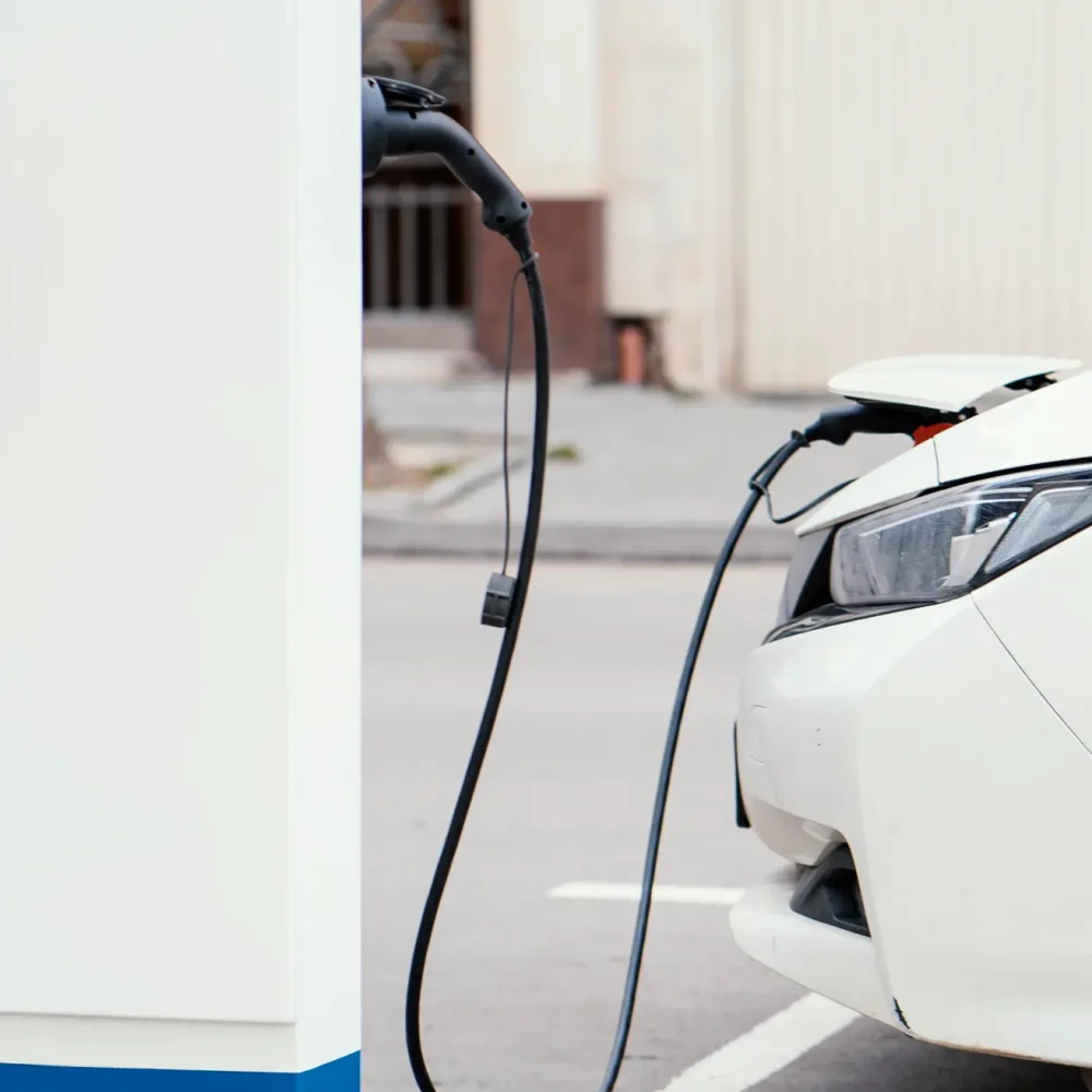 side-view-car-being-charged-electric-vehicle-charging-station